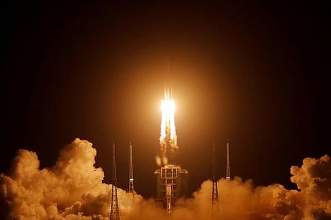 China calls launch a success as robotic spacecraft heads to moon