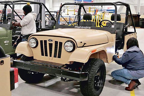 Mahindra and Mahindra, TVS ASL to integrate Mahindra First Choice Service business via share swap deal