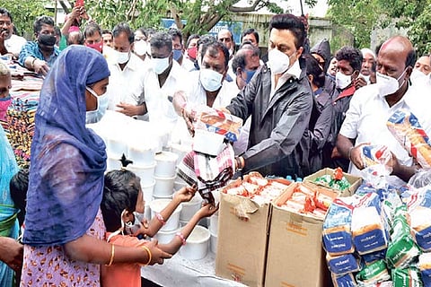 DMK chief Stalin providing relief in Chennai on Thursday