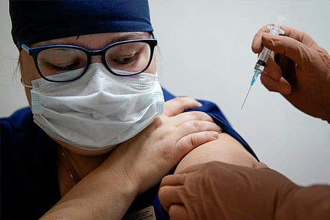 Russia?s experimental Sputnik vaccine being administered to a health worker last month.