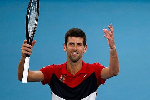 Djokovic sweeps past Galan into last 16