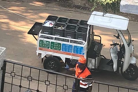 The Urbaser Sumeet Battery operated vehicle (BOV) door to door collection at a home in Adyar
