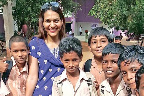 Poongkothai Chandrahasan with students