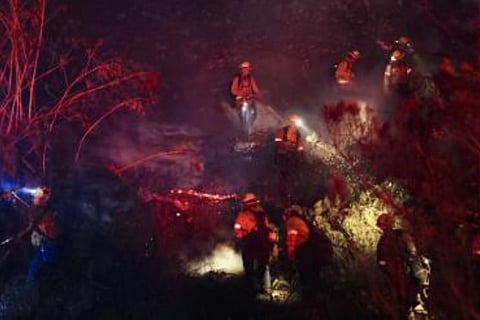 Over 13,800 firefighters battle 21 major wildfires in California