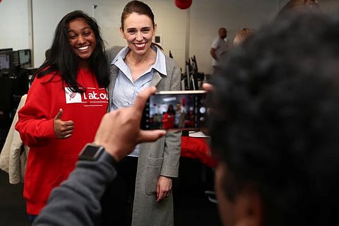 NZ PM Ardern touts success in tackling pandemic in poll push