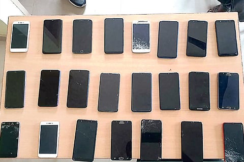 As many as 26 phones, worth lakhs of rupees, were seized from the trio arrested by Nolambur police
