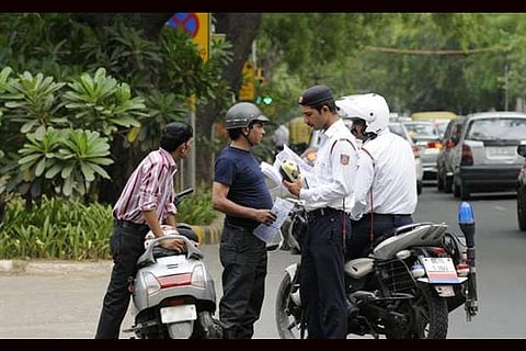 3-month suspension of driving license for riding without helmet in Karnataka