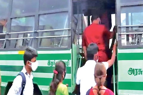 People boarding a bus to Yercaud hills from Salem on Wednesday.