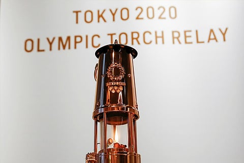 The Olympic Flame in lantern is seen on display at Japan Olympic Museum in Tokyo, Japan