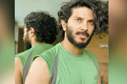 Dulquer Salmaan gets busy 'rocking some curls'