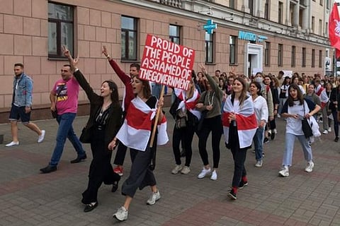 Masked men drag protesting Belarusian students off the streets