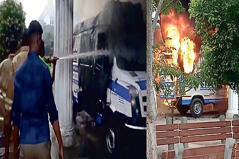 Fire and Rescue Service personnel in action after a 108 ambulance went up in flames