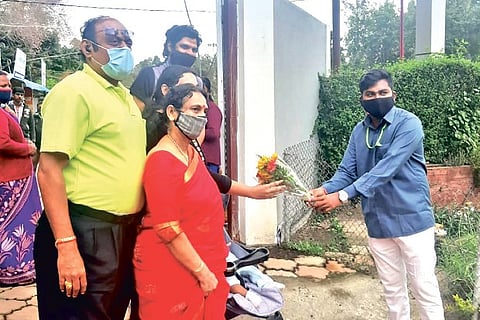 Tourists welcomed with bouquet after a long break at bryant park in Kodaikanal