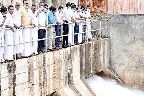Animal Husbandry Minister ?Udumalai? K Radhakrishnan releasing water from Amaravathi dam in Tirupur
