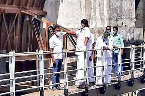 Kalasapakkam MLA V Paneeerselvam checking repair work at Shenbagathoppu dam in Tiruvannamalai dist