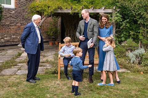 Prince George receives a prehistoric gift from broadcaster David Attenborough