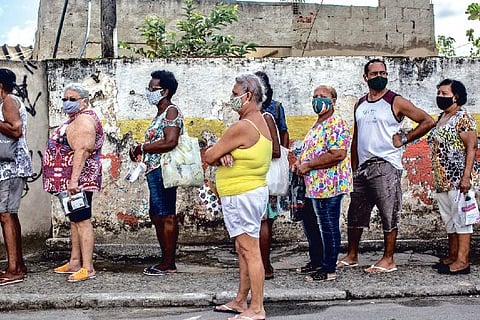 In sprint between vaccines and variants, shots will eventually win