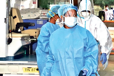 Kanimozhi arrives in PPE to cast her vote