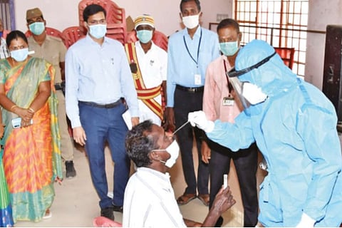 Thanjavur Collector M Govinda Rao oversees a fever camp in the district on Thursday