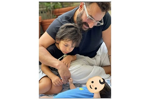 Kareena posts pic of newborn son, hides face with emoji