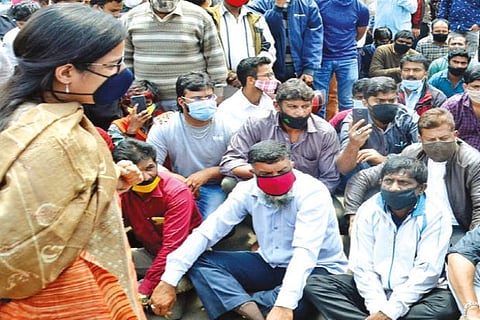 Traders staging a sit in stir against closure of tourist spots in The Nilgiris on Monday