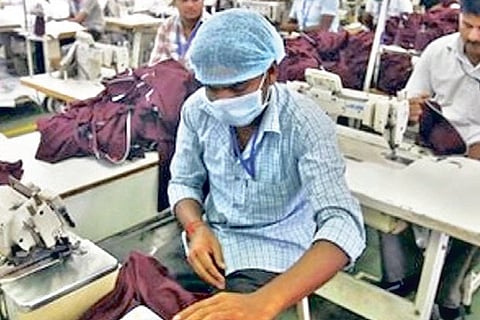 Textile workers at a knitwear unit (file picture)