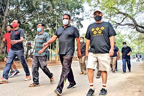 A large number of people turned up in black attire for a walk on the Race Course road on Wednesday.