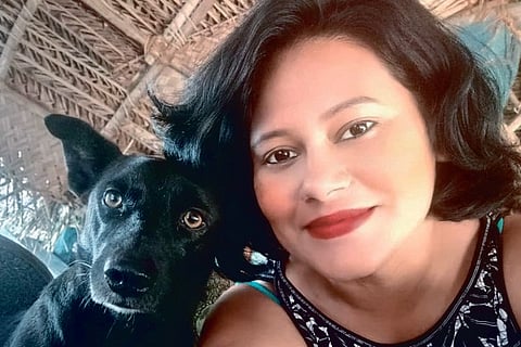 Keerthi with her adopted dog Bowoo