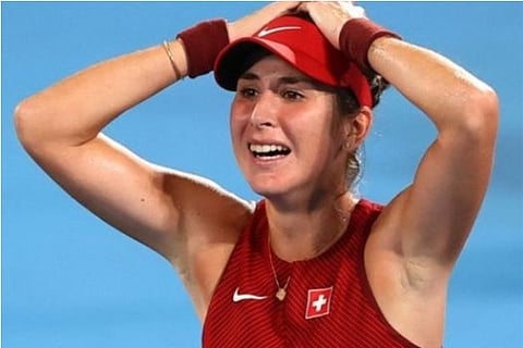Belinda Bencic of Switzerland beams with joy after winning gold (Credit: Reuters)