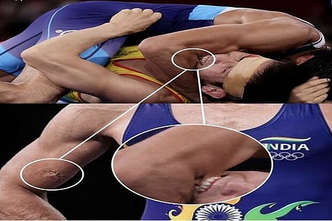 Ravi Dahiya Wrestling with Nurislam Sanayev in Tokyo Olympics 2020 (Source: Virender Sehwag/Twitter)