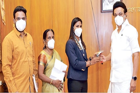 Fencer CA Bhavani Devi, who returned from Olympics, presenting her sword to Chief Minister MK Stalin
