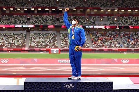 Neeraj Chopra with his Gold Medal (Source: Reuters)
