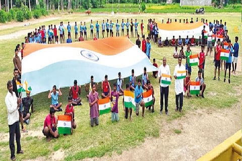 Youth of Kammavanpet with the 600 square feet nation flag to be hosted on a 100-foot pole