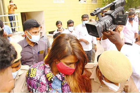 Actress Meera Mithun being taken to a court in the city on Sunday