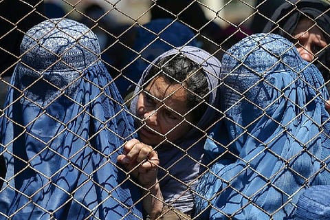 'Times have changed': some Afghan women defiant as Taliban return