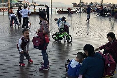 China allows couples third child amid demographic crisis