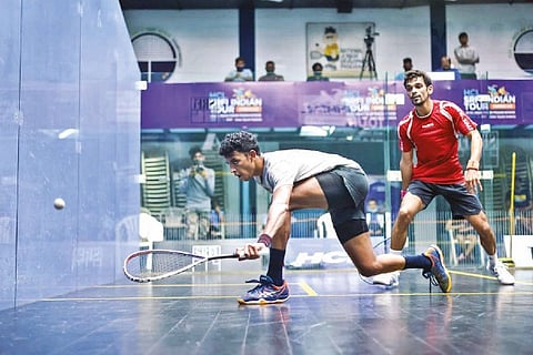 Velavan Senthilkumar (left) in action against Abhishek Agarwal