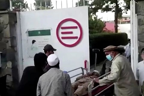 Exhausted Kabul hospital staff fear more attacks may come