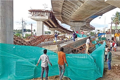 The collapsed girder of flyover which is under construction near Bank Colony on Natham Road in Madurai