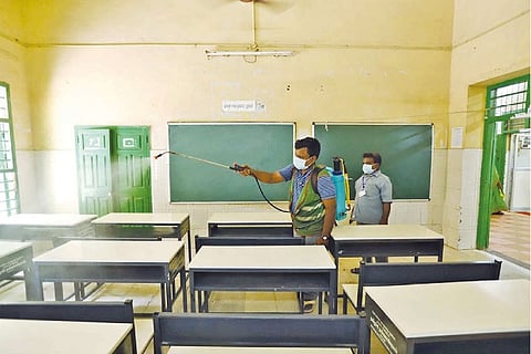 Workers are disinfecting classrooms and premises of all schools ahead of reopening on September 1