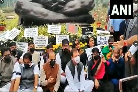 Opposition parties staged a protest before the statue of Mahatma Gandhi (Photo: ANI)