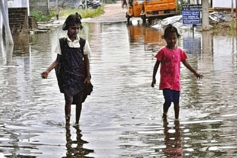 Kids wade through pool of stagnant water mixed with sewage near Harveypatti in Madurai