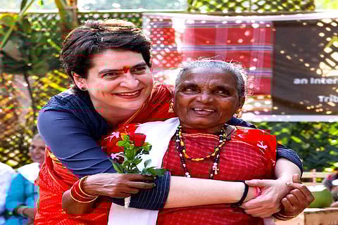 Priyanka Gandhi Vadra with a tribal women at Morpirla village in South Goa