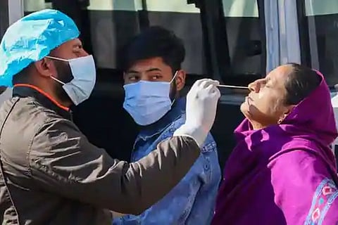 A health worker taking RT-PCR test (Image credit: PTI)