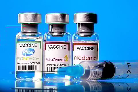Vials with Pfizer-BioNTech, AstraZeneca, and Moderna coronavirus vaccines (Credit: Reuters)