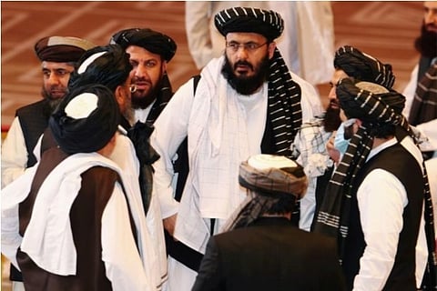 Source: Reuters (File Photo); Taliban delegates