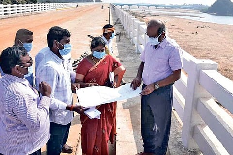 Collector S Sivarasu inspecting bridge works at Kallanai in Tiruchy on Tuesday