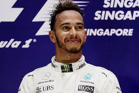 F1 champion Hamilton signs 1-year deal to stay at Mercedes