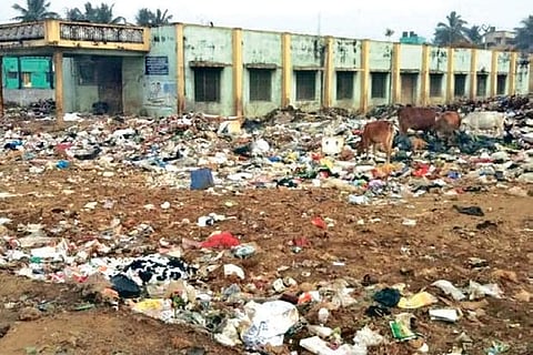 Garbage dumped by panchayat in an open public ground in Urapakkam