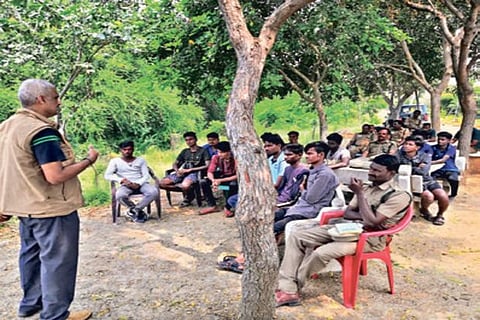 Conservation scientist A Kumaraguru giving tips to bird watchers